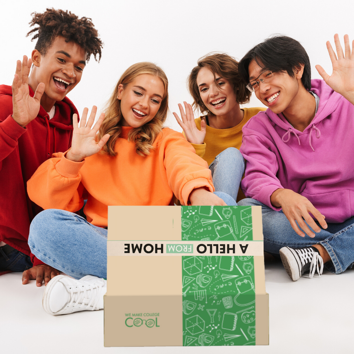 Students with green Freshman Fun Box™️ 